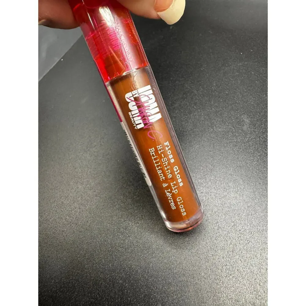 NWT UOMA High Shine Lip Gloss in shade Edible SEALED NO BOX